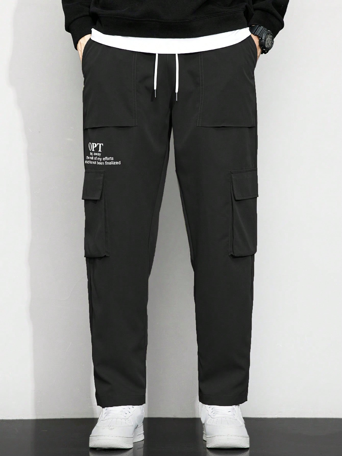 Calça Masculina Cargo Solta Estampa Gráfica E Bolsos Sobrepostos Calça Masculina Cargo Solta Estampa Gráfica E Bolsos