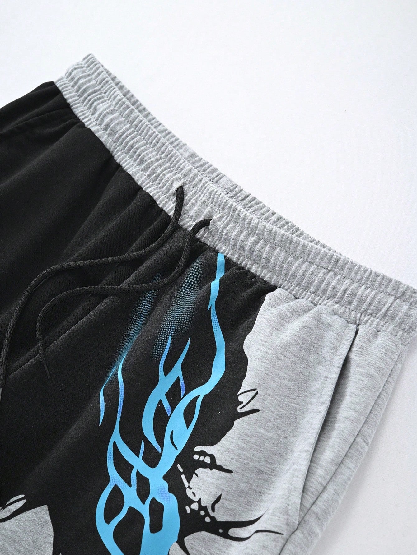 Calça Masculina Jogger Bicolor Com Estampa De Fé Estilizada Calça Masculina Jogger Bicolor Com Estampa De Fé Estilizada