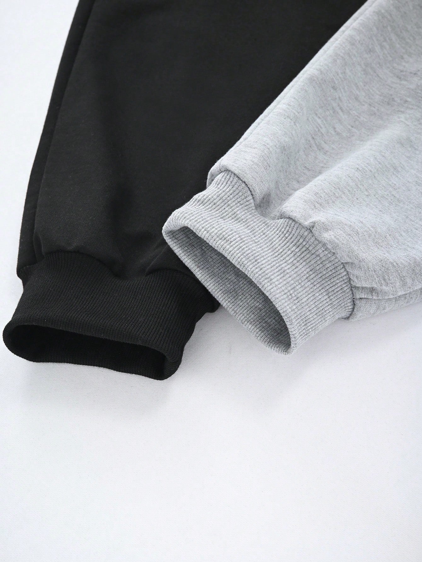 Calça Masculina Jogger Bicolor Com Estampa De Fé Estilizada Calça Masculina Jogger Bicolor Com Estampa De Fé Estilizada