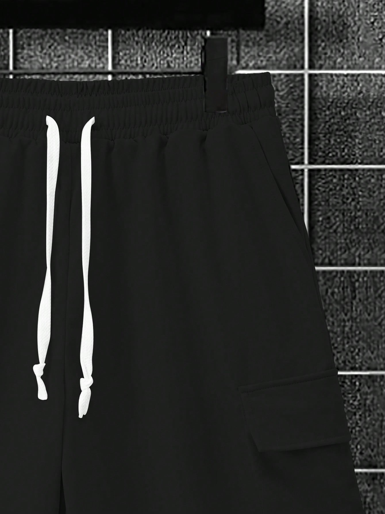 Conjunto Masculino Camiseta Ombro Caído E Shorts Estilo Solto Conjunto Masculino Camiseta Ombro Caído E Shorts Estilo