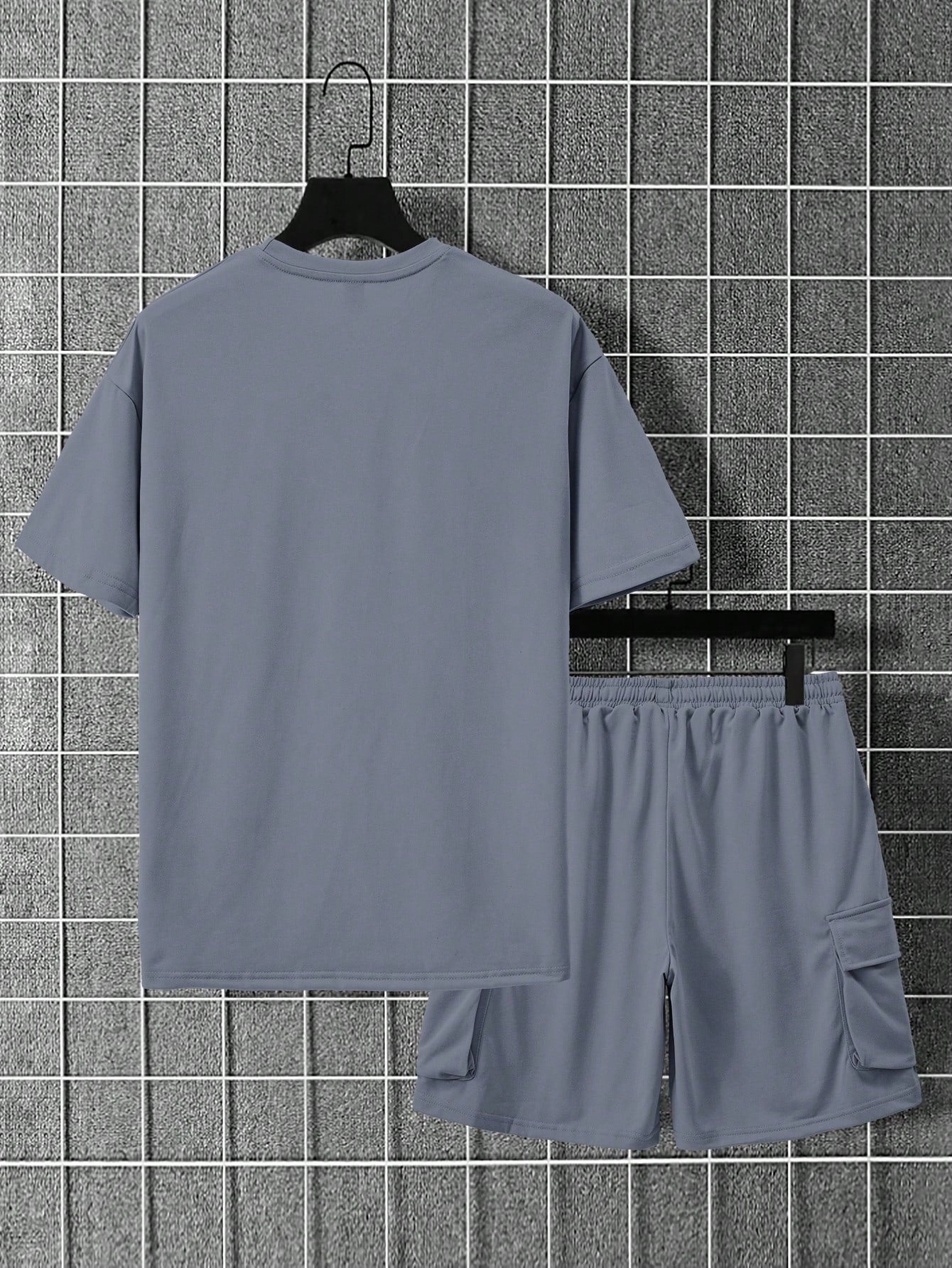 Conjunto Masculino Camiseta Ombro Caído E Shorts Estilo Solto Conjunto Masculino Camiseta Ombro Caído E Shorts Estilo