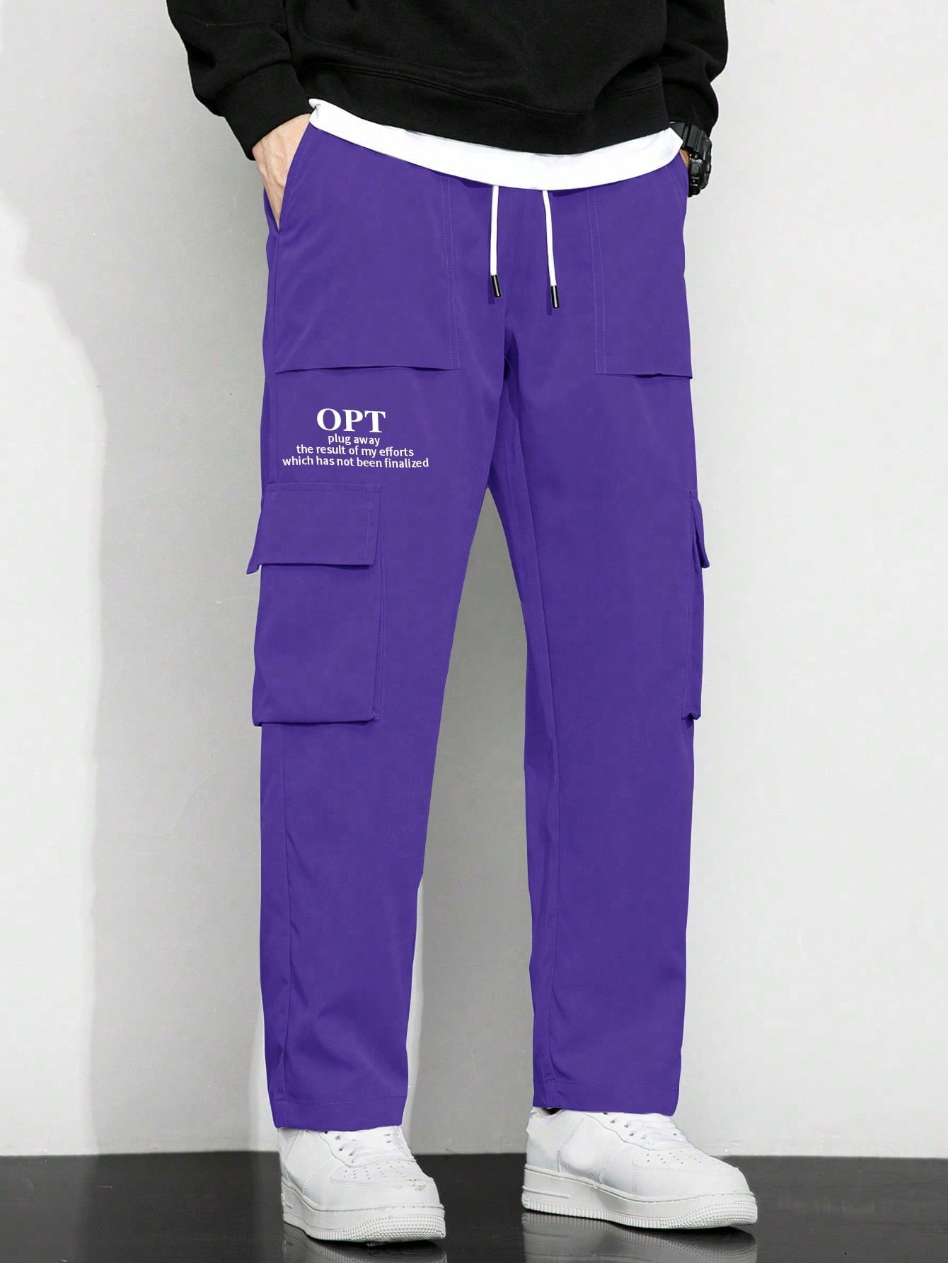 Calça Masculina Cargo Solta Estampa Gráfica E Bolsos Sobrepostos Calça Masculina Cargo Solta Estampa Gráfica E Bolsos