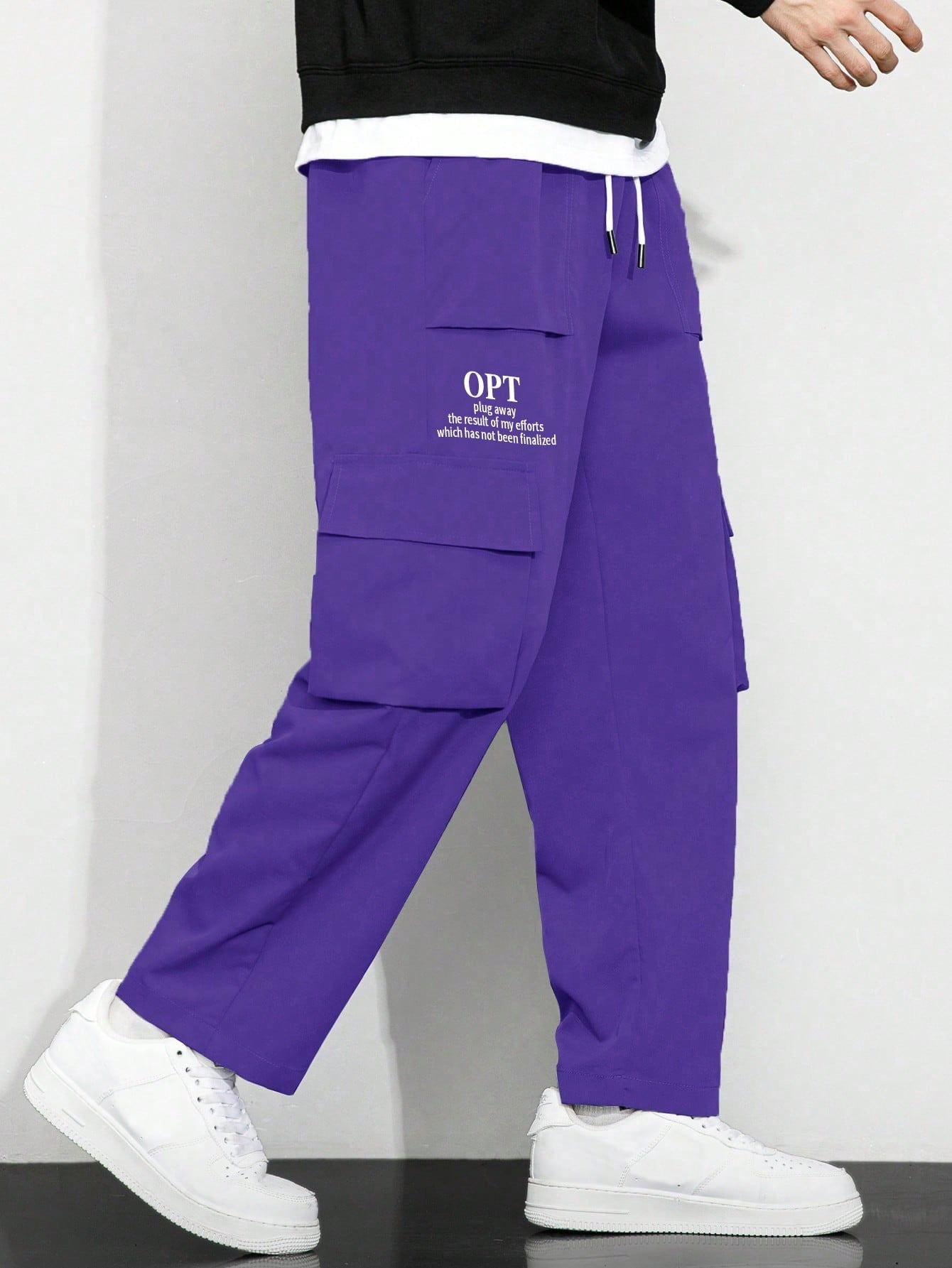 Calça Masculina Cargo Solta Estampa Gráfica E Bolsos Sobrepostos Calça Masculina Cargo Solta Estampa Gráfica E Bolsos