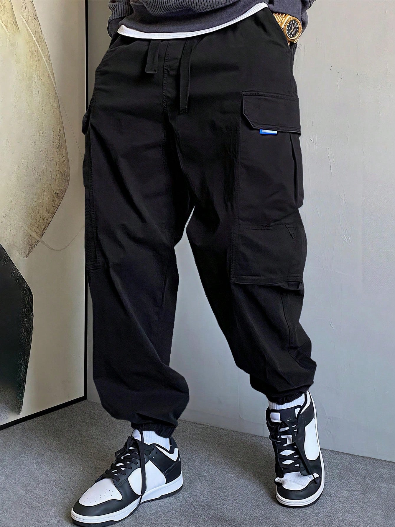 Calça Masculina Jogger Com Design Solto E Bolsos Laterais Preto / PP Calça Masculina Jogger Com Design Solto E Bolsos