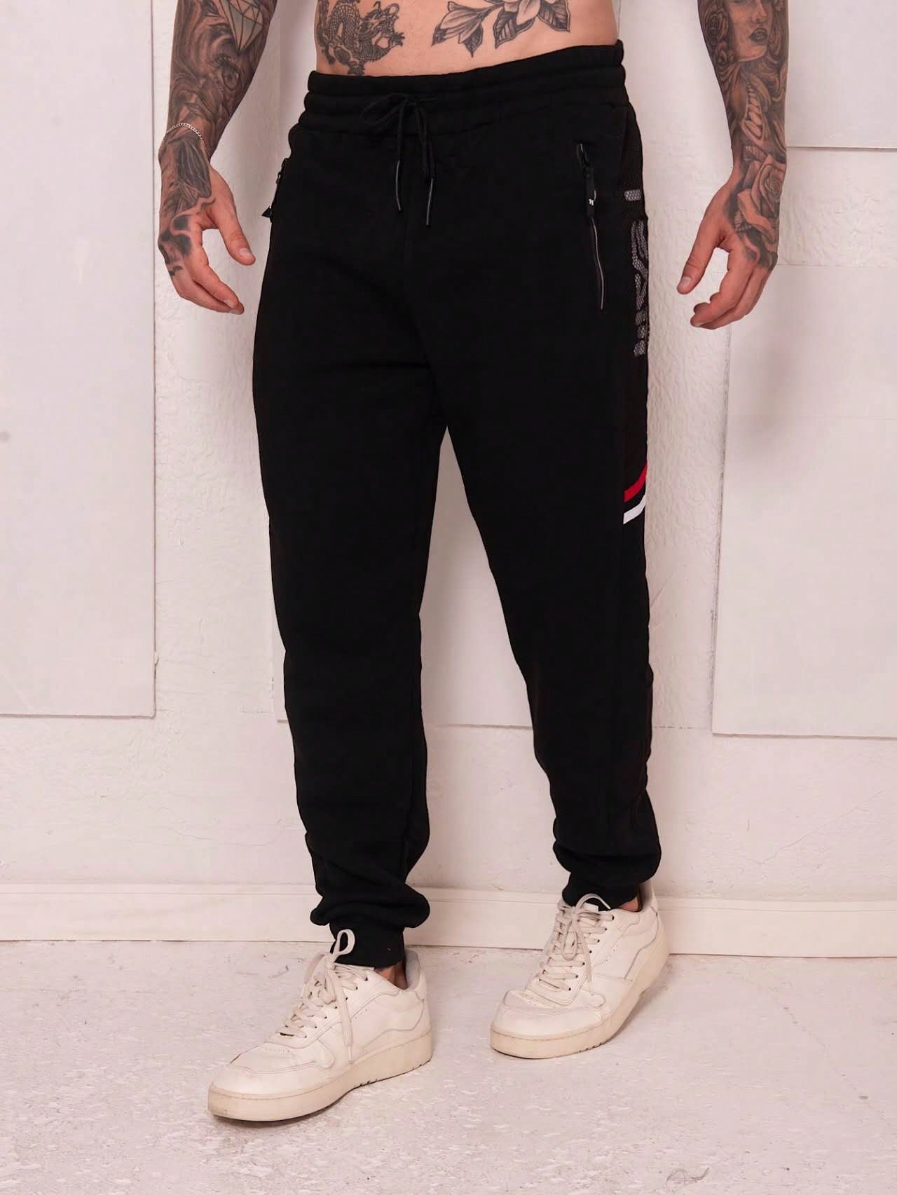 Calça Masculina Jogger Esportiva Com Estampa Team E Zíper Calça Masculina Jogger Esportiva Com Estampa Team E Zíper