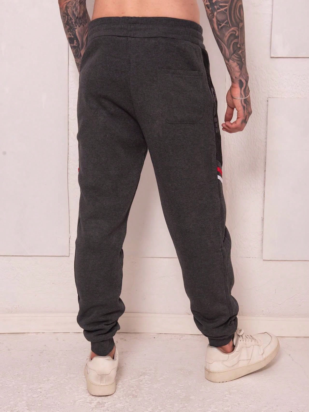 Calça Masculina Jogger Esportiva Com Estampa Team E Zíper Calça Masculina Jogger Esportiva Com Estampa Team E Zíper