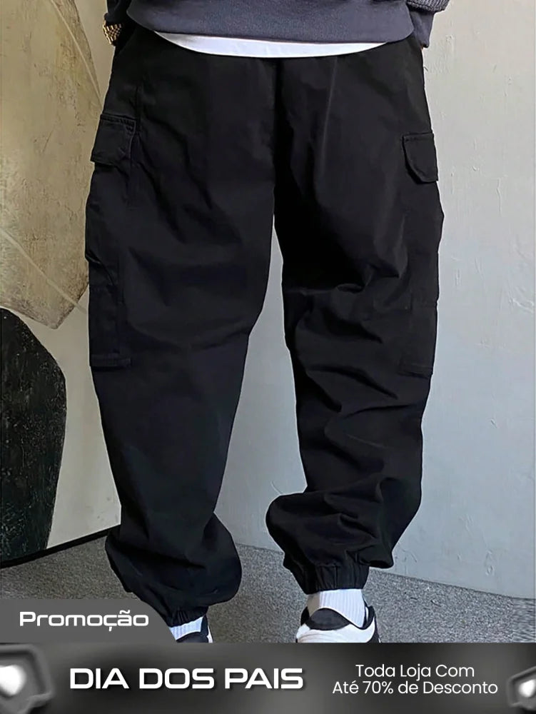 Calça Masculina Jogger Com Design Solto E Bolsos Laterais Calça Masculina Jogger Com Design Solto E Bolsos Laterais