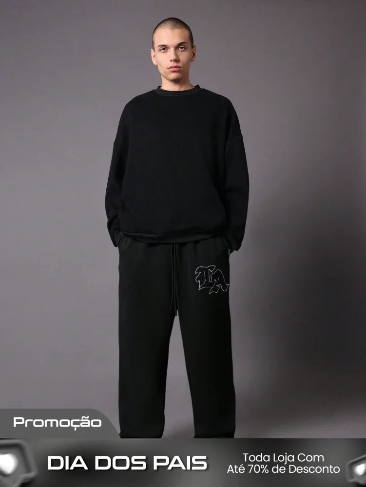 Calça Masculina Wide Leg Com Bordado Estilizado E Cós Ajustável Calça Masculina Wide Leg Com Bordado Estilizado E Cós
